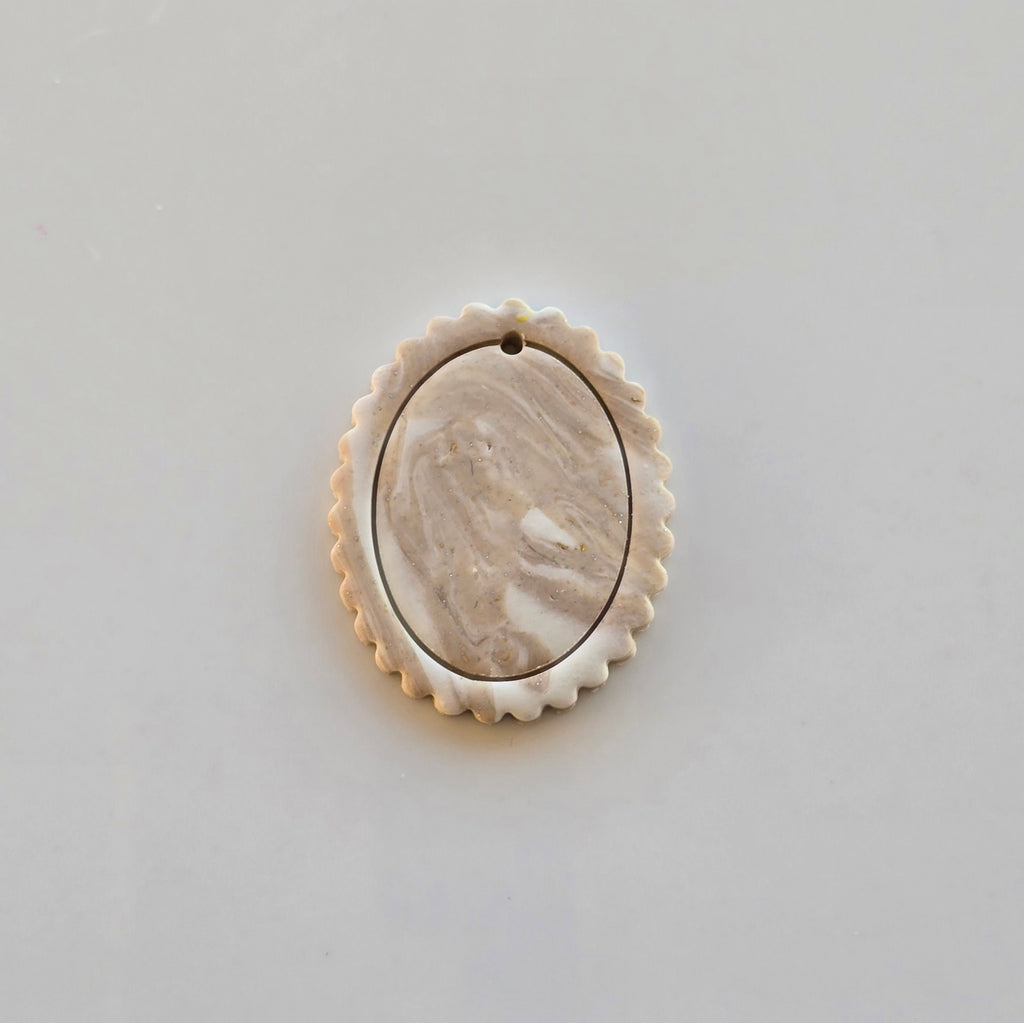 Scalloped Oval Frame Marble