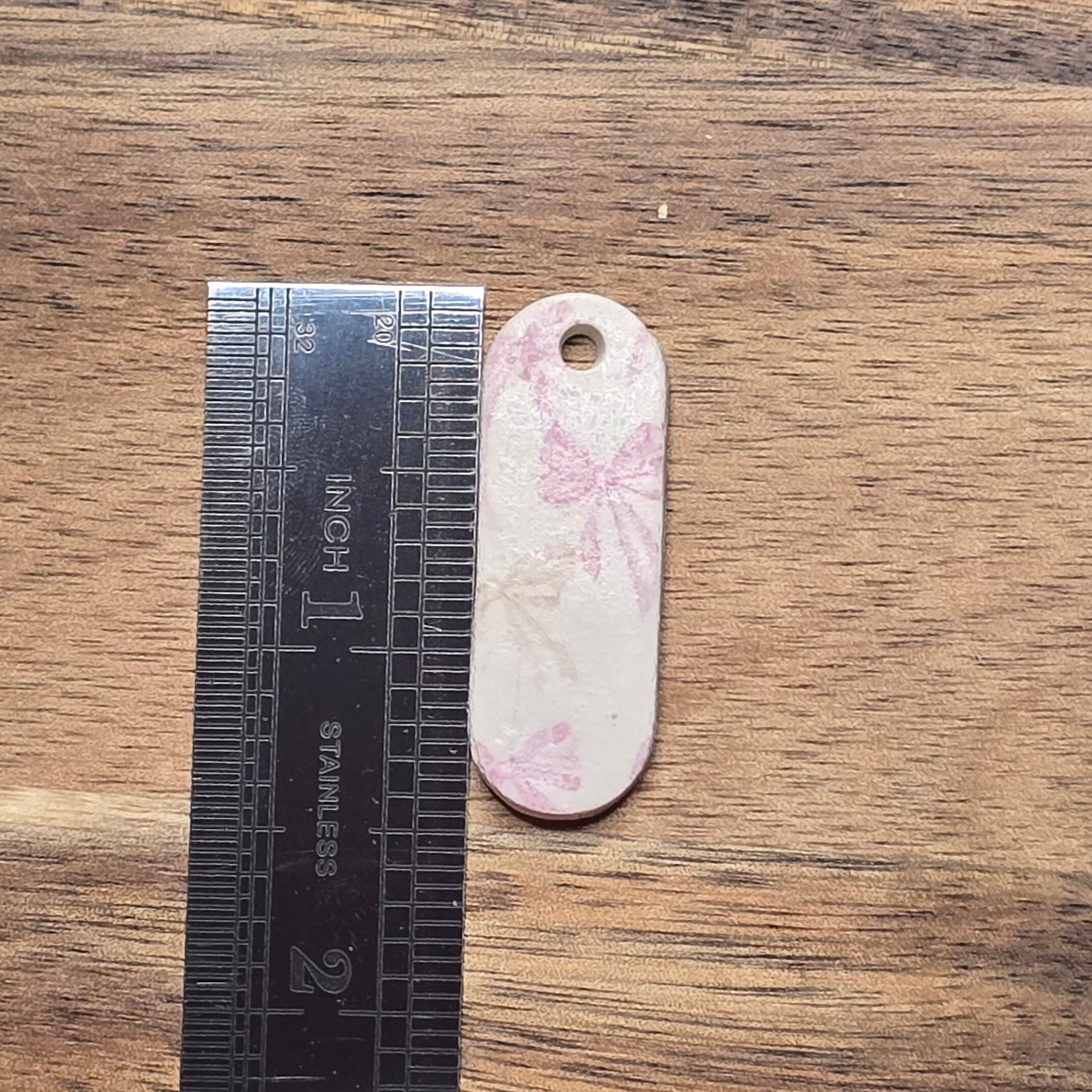 Elongated tags with bows